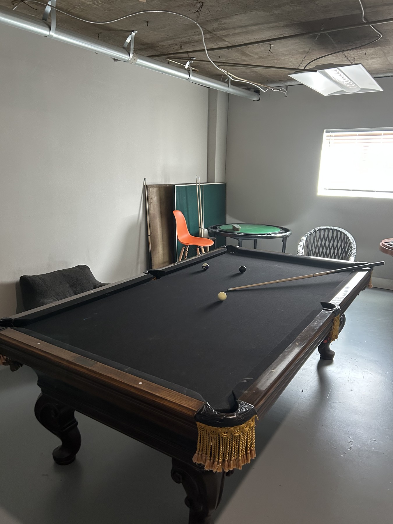 Pool table and recreation area in the Men of Nehemiah clubhouse