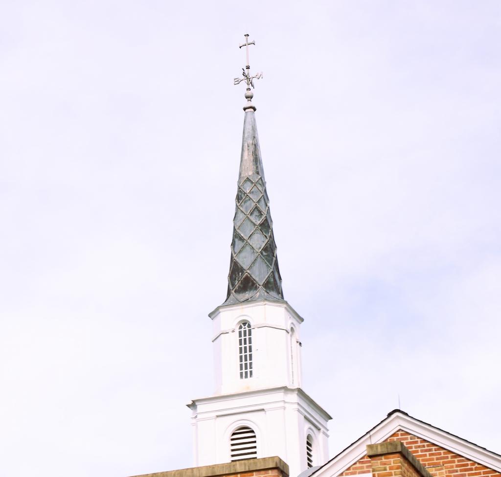 Steeple and cross on The Well Community Church building